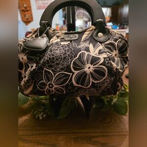 Relic Black and Cream Floral Women's Satchel By Fossil 10" Tall By 14" Wide.